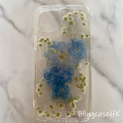送料無料 キラキラ 本物の花 デイジー 押し花ドライフラワー 樹脂 iPhone全機種対応 ケース クリア スマホケース 1枚目の画像