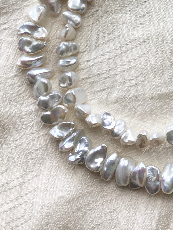 完売です　#393 keshi 湖水真珠　【6個】メタリック白ケシ　6.7×4ミリ　天然色メタリック白　高品質淡水真珠 9枚目の画像