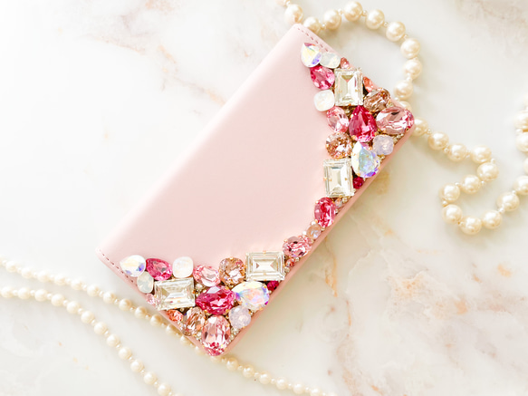 ベビーピンク手帳型 iPhone15pro,14,13,他 スワロフスキーデコレーションケースピンク系ビジューカバー また クリスタル