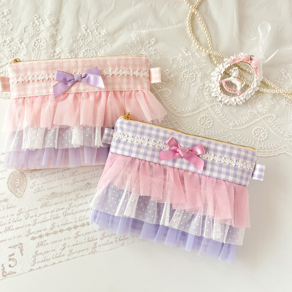 さえら ヒスクローネ 大きめの花とフリルのポーチ フリルポーチ