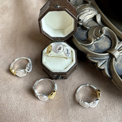 コインモチーフリング指輪シルバーゴールド 1枚目の画像