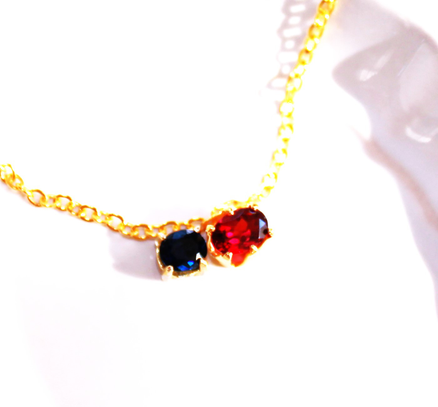 - Odd-eye design - Sapphire & Garnet Necklace