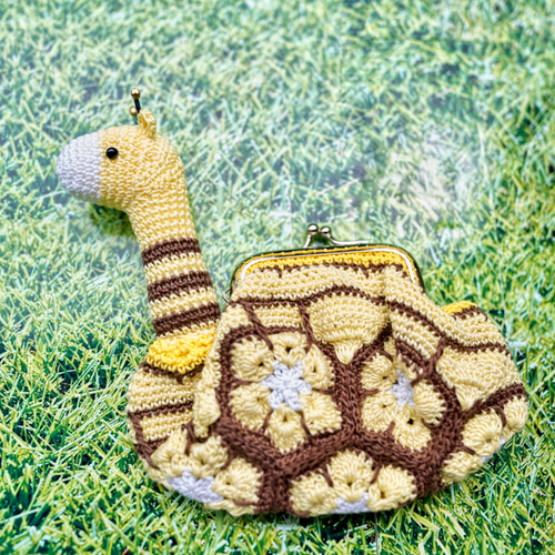 アフリカンフラワーのキリンのがま口ポーチ ポーチ ハートくじら