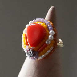 おゃべりな指輪100 フリーサイズ　ビーズ刺繍のリング　オレンジ　マルチカラー　個性的 1枚目の画像