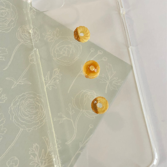 ドーナッツ と ホットケーキ の スマホケース【iPhone全機種対応】メープル はちみつ キャラメル フェイクスイーツ 1枚目の画像