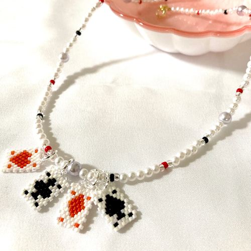 ハンドメイド】デリカビーズわんちゃんペンダント ねばっこい