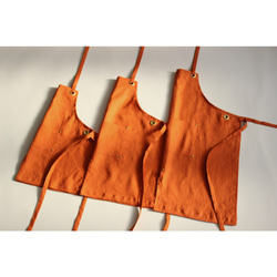 上質リネン キッズエプロン【 Eyelet switching kids apron 】Orange S,M,L 1枚目の画像