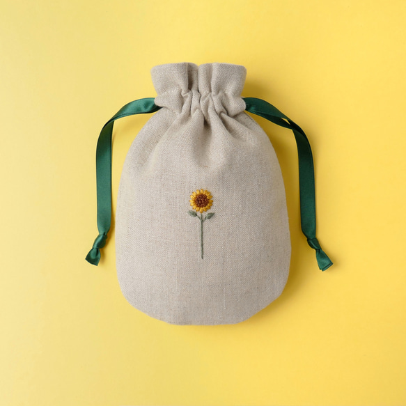 ひまわりん様　ハンドメイドオーダーポーチ 名入れ》ひまわり＊リネンの手刺繍巾着ポーチ(しずく型)＊ 巾着袋