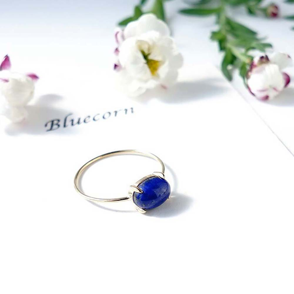 K10 ラピスラズリ オーバル 爪留めリング 天然石 ~夜空のような青い深み