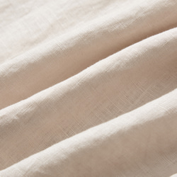 一件亞麻襯衫，隨著你的每個動作變換著不同的外觀。 100% 亞麻，米色。 230404-1 第10張的照片