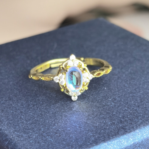 再出品 ヴェネツィア 透明ムーンストーン12個星ダイヤに囲まれ透かし