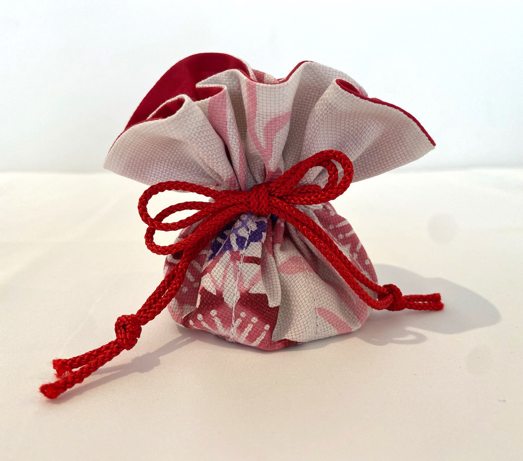 【紅型巾着】《旅きんちゃく》アクセサリーポーチ　丸5 4,940円