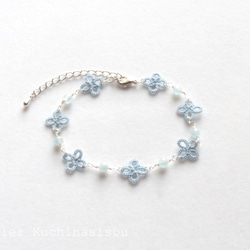 [訂做] [三月生日石] 梭織蕾絲小花與海藍寶石手鍊 第2張的照片