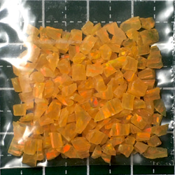 《人工オパール》(ネオンオパール) 原石 オレンジ/赤斑 3.4g ⑮ (樹脂含侵) 2枚目の画像