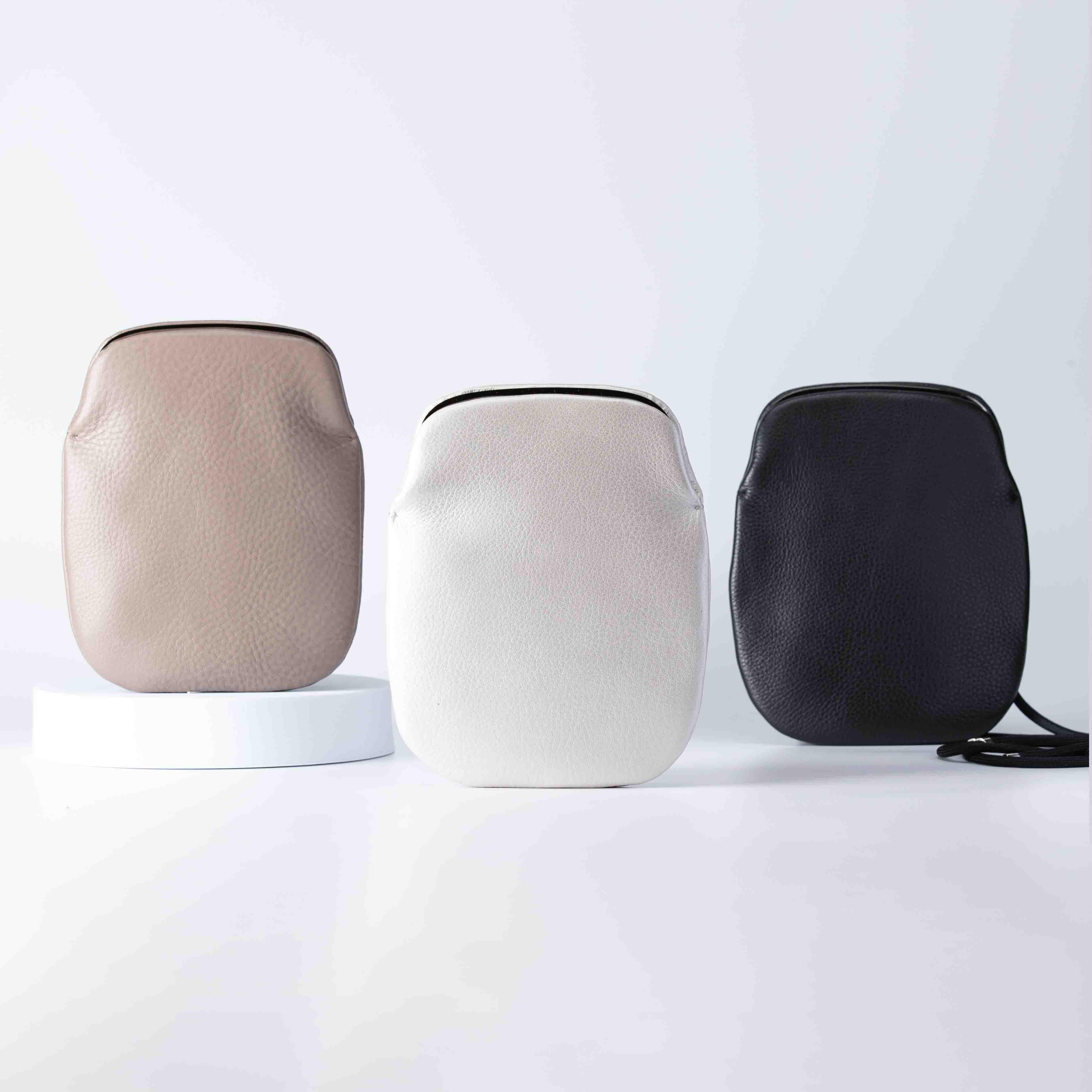 「押し口のスマホポシェット」