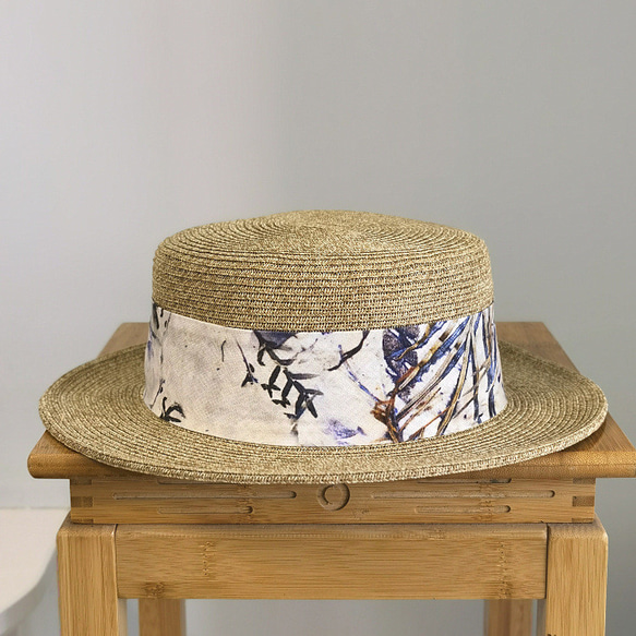 春と夏のシンプルなカジュアル国民風花布装飾ビーチ風太陽保護女性フラットトップファッション麦わら帽子。 4枚目の画像