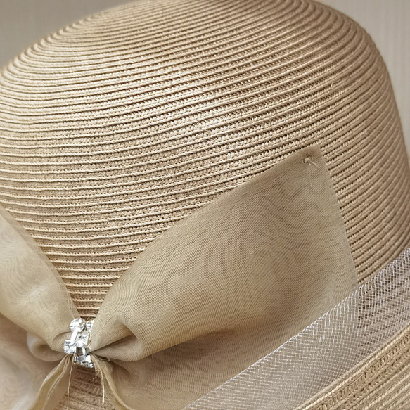 春夏の日は、コガネ糸弓の装飾をロールエッジ麦わら帽子漁師の帽子盆地キャップファッション麦わら帽子を取る。 6枚目の画像