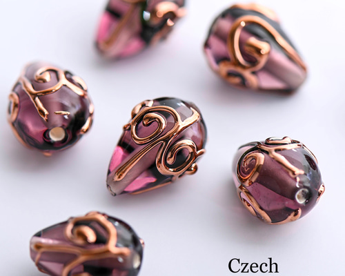 ネパール・チベットスタイルの編み込み象嵌ハンドメイドビーズストラッ（人工琥珀） ネパール・チベットスタイルの編み込み象嵌ハンドメイドビーズ