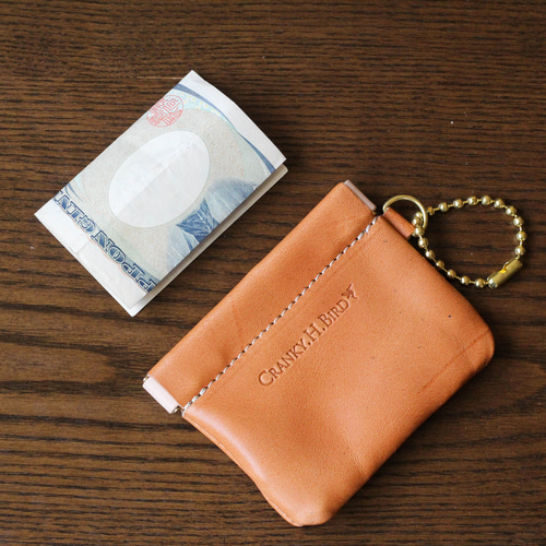 soldヌビキルトバネ口金ポーチ