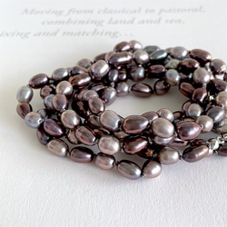 金屬紫色長項鍊，兩種珍珠交替連接 第11張的照片