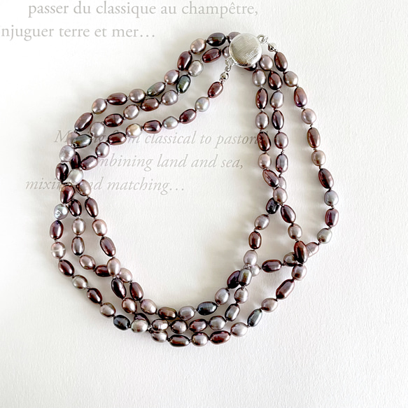 金屬紫色長項鍊，兩種珍珠交替連接 第1張的照片