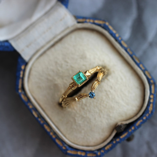 エメラルド0.18ct ミルフレーム×フィッシュボーンアーム K18YG リング  