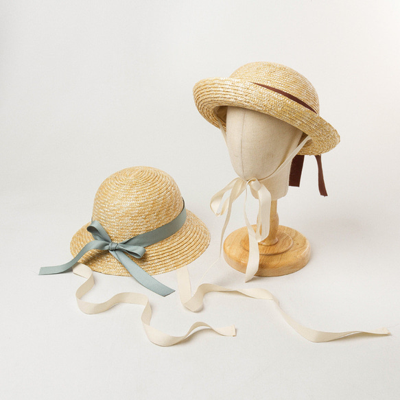かわいい子供の春と夏の新しい弓の結び目の装飾麦わら漁師の帽子夏の屋外旅行日除け麦わら帽子で 5枚目の画像