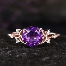 ユニークな天然ローズクォーツ婚約指輪モアッサナイトケルトノット