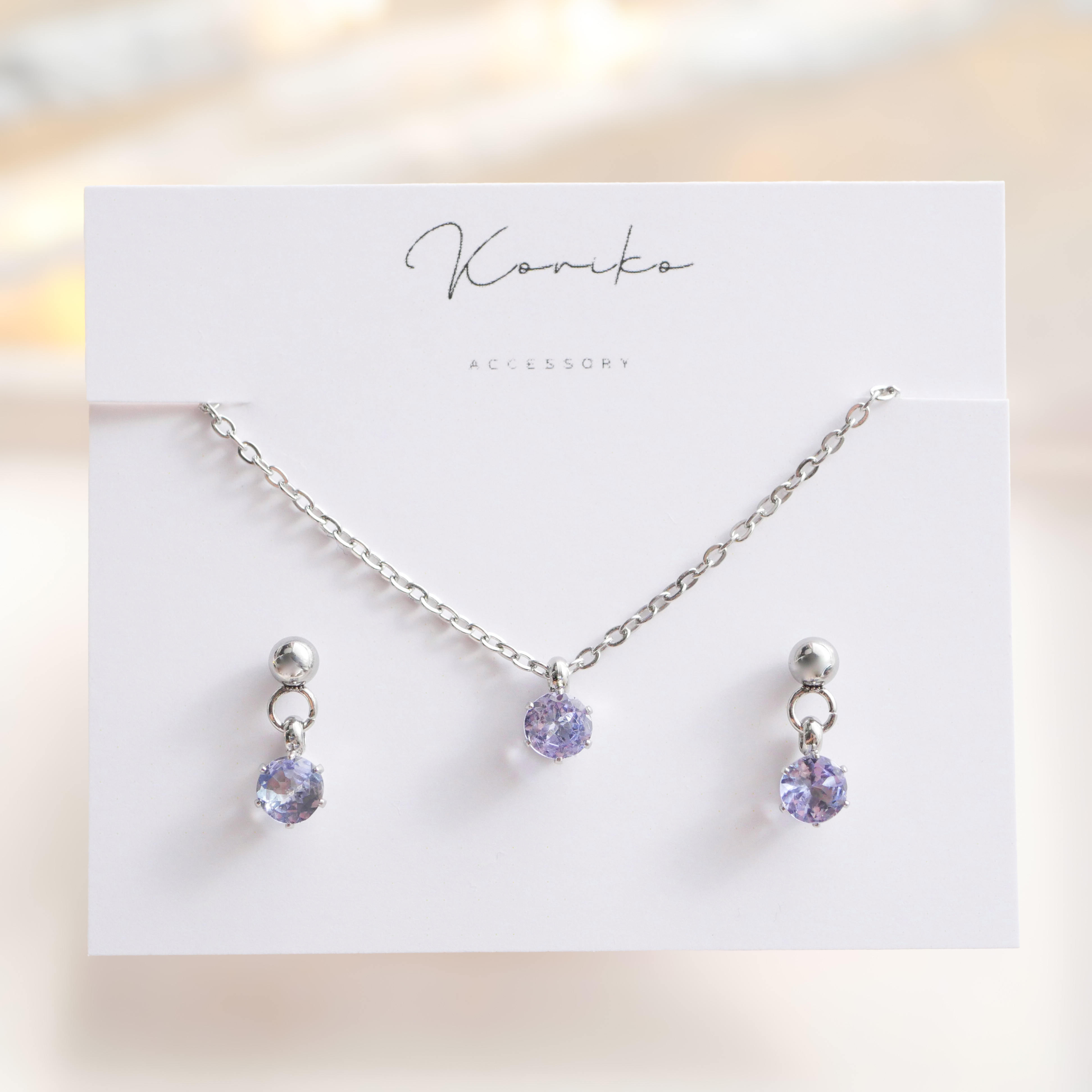 タンザナイトの一粒揺れるピアスとネックレスの2点セット　12月誕生石　つけっぱなしOK サージカルステンレス　金アレ対応