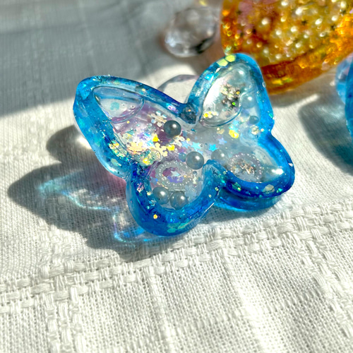 雑誌で紹介された シャカシャカキーホルダー(ちょう・水色) その他雑貨 青星 通販 チャーム