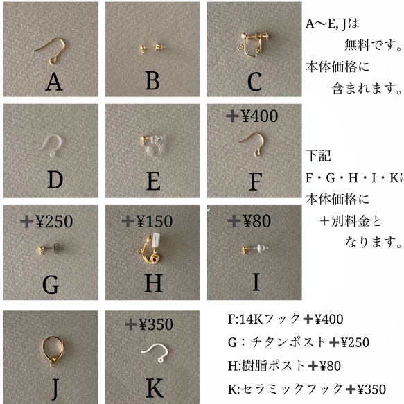 bi-color(白*シルバー)雫と楕円の耳飾り 2枚目の画像