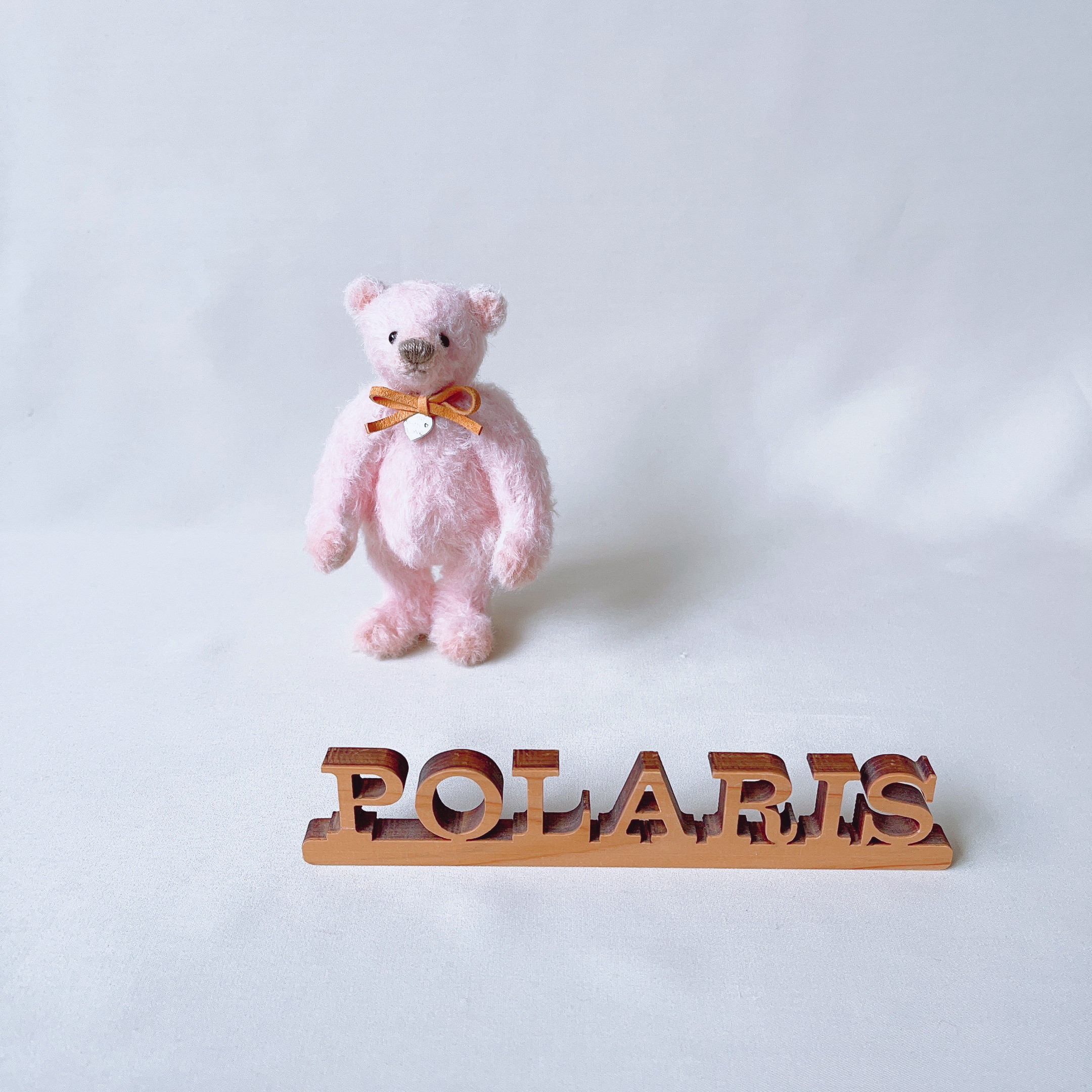 手のひらサイズのテディベア（淡ピンク）