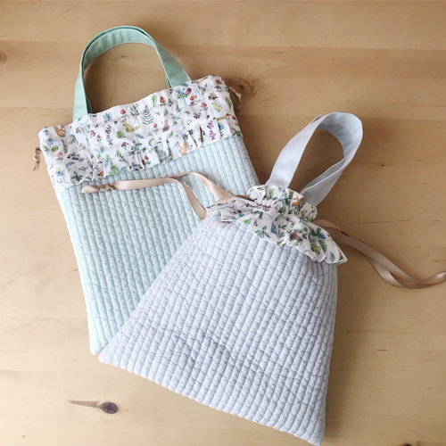 【パックりか❤様お取置き専用ページ】リバティ×ヌビ　巾着バッグ パックりか❤様お取置き専用ページ】リバティ×ヌビ 巾着バッグ