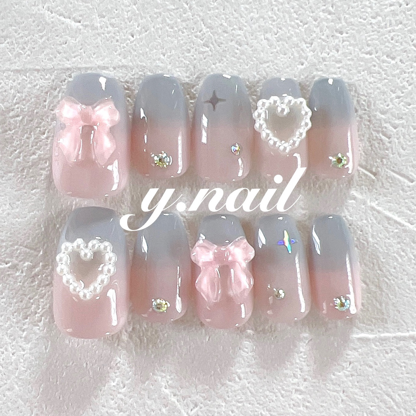 ピンク・グレーのグラデーションネイル/リボンネイル/ハートネイル  