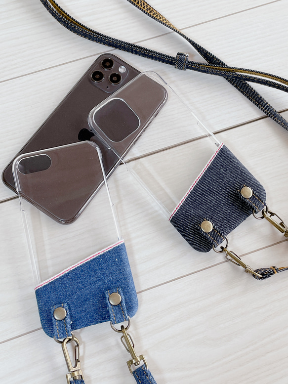 岡山牛仔布透明智慧型手機保護套帶智慧型手機肩布邊（靛藍、淺靛藍） 第1張的照片