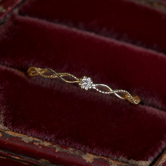 再販400ケ超！透かし細工　小さい星ダイヤ　細目　14金仕上げリング　フリーサイズ 1枚目の画像