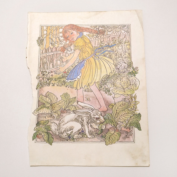 黄色いワンピースの三つ編みの少女とウサギ リトアニア洋書 カルトン戯画 イラスト図版 ヴィンテージペーパー2002ｰ12 1枚目の画像