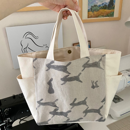 高質 ミナペルホネン Mサイズ ポケット トートバッグ バッグ(女性用