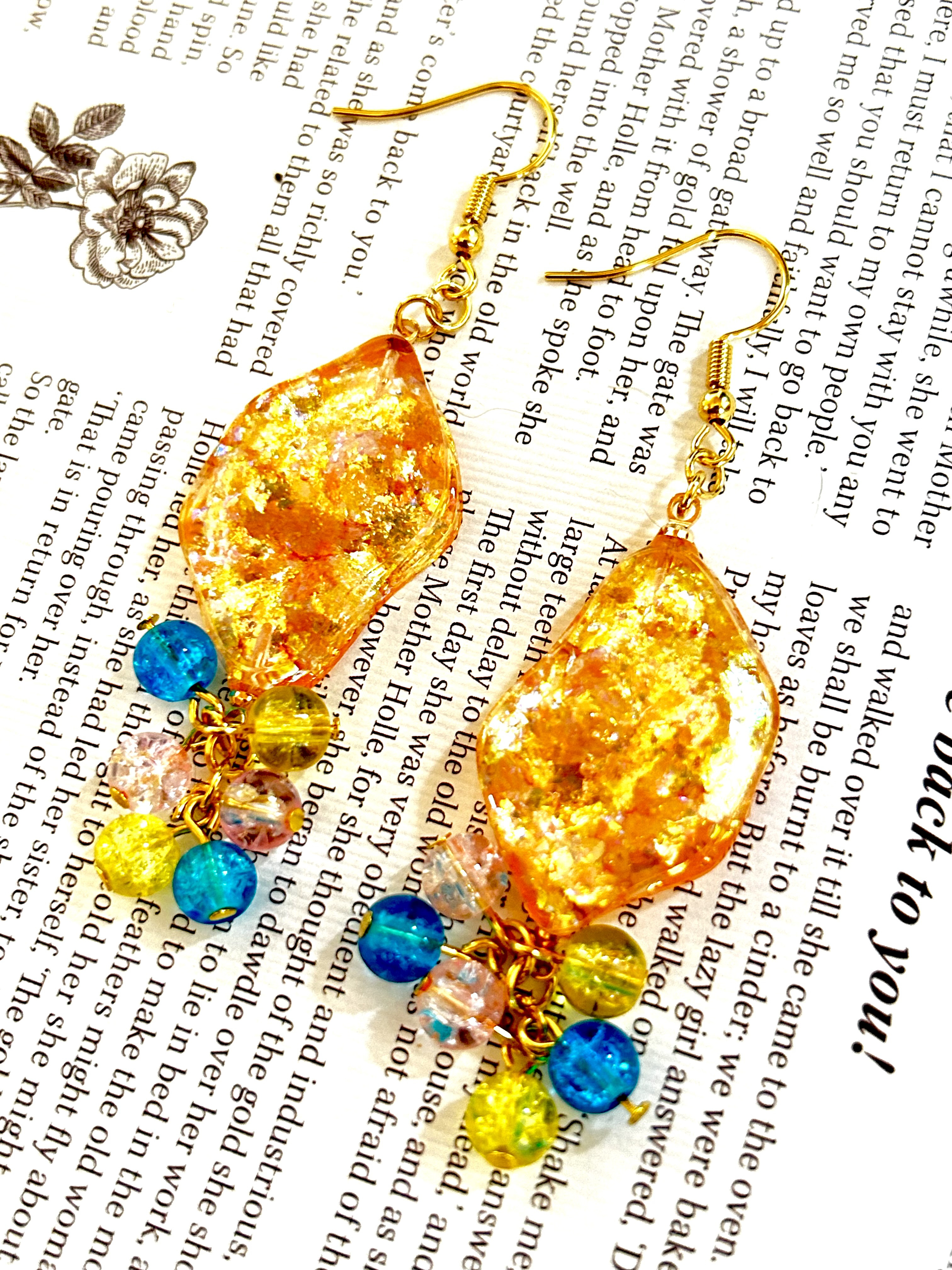 No.1499-E　細長オーロラ☆星☆レジン☆ピアス・イヤリング(オレンジY)