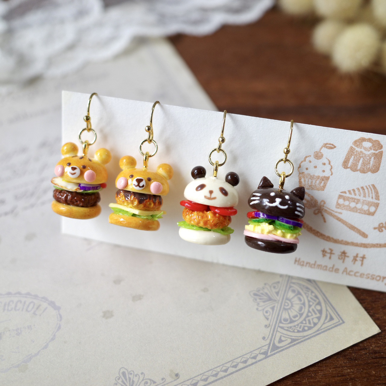 【即出荷】 ハンバーガーを運ぶ猫ピアス ピアス