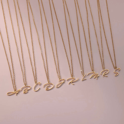 ゴールドの筆記体手書き風ロゴが可愛い\tCHANEL\tバングル 中古・古着通販】CHANEL (シャネル) ヴィンテージロゴバングル