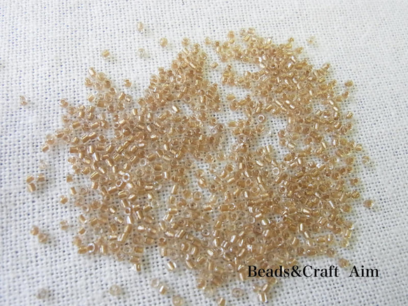 カットビーズ　ライトベージュゴールド×クリア 1枚目の画像