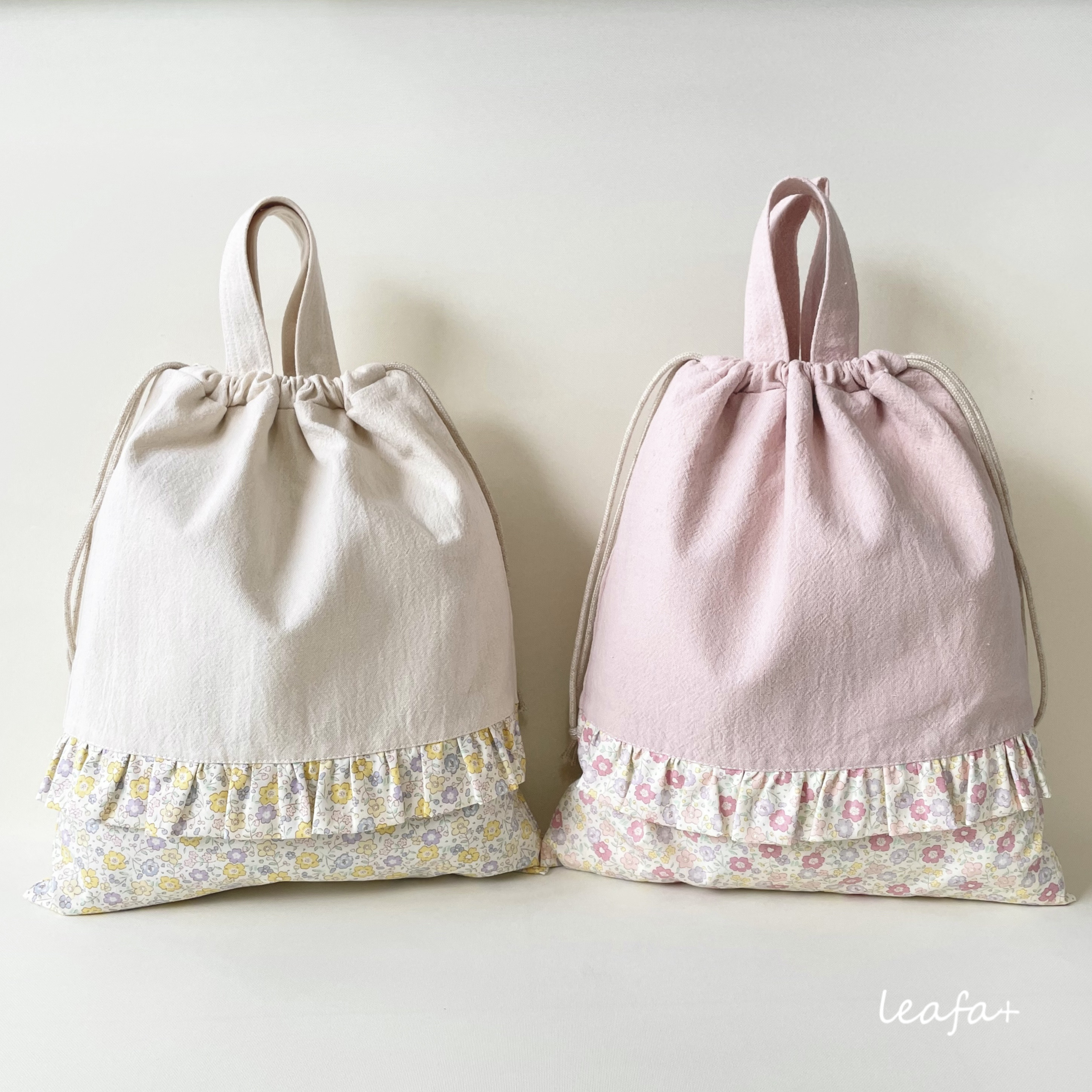 ナップサック型お着替え袋♡ フリル付き花柄 ナップサック型お着替え袋♡ フリル付き花柄