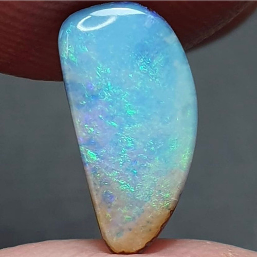 ギラギラとぅるとぅるボルダーオパール ボルダーオパール 原石磨き オーストラリア産 2.52ct[240226204