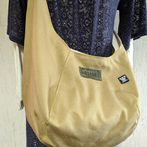 Indian school of Fujairah-isf ミナペルホネン ポケット巾着バッグ go