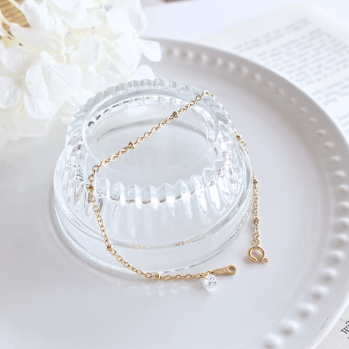 タイチンルチル ブレスレット黄金に輝く水晶 7mm玉 手首サイズ16.5cm