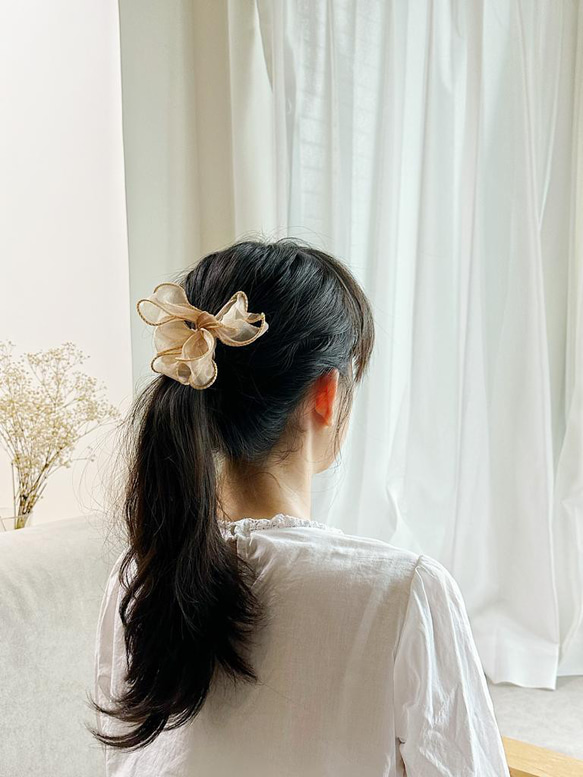 ブラウンフラワーリボン編み込みスクラッチヘアアクセサリー 1枚目の画像