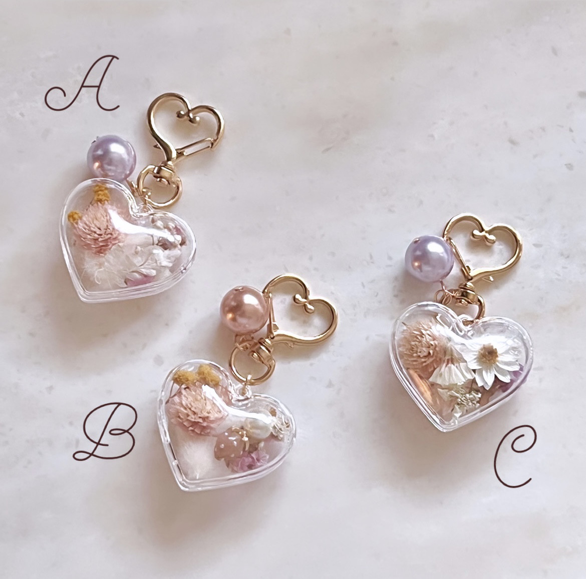 固まるハーバリウム〜ハート型♡カプセル キーホルダー２個セット⑥ 固まるハーバリウム〜ハート型♡カプセル キーホルダー2個