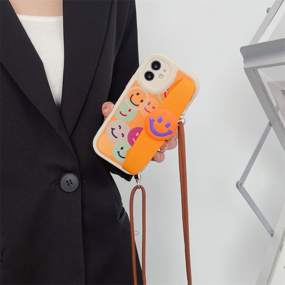スマホショルダー 多機種対応 オレンジ色の笑顔 スマホケース ストラップ付け  iphoneケース huaweiケース 3枚目の画像