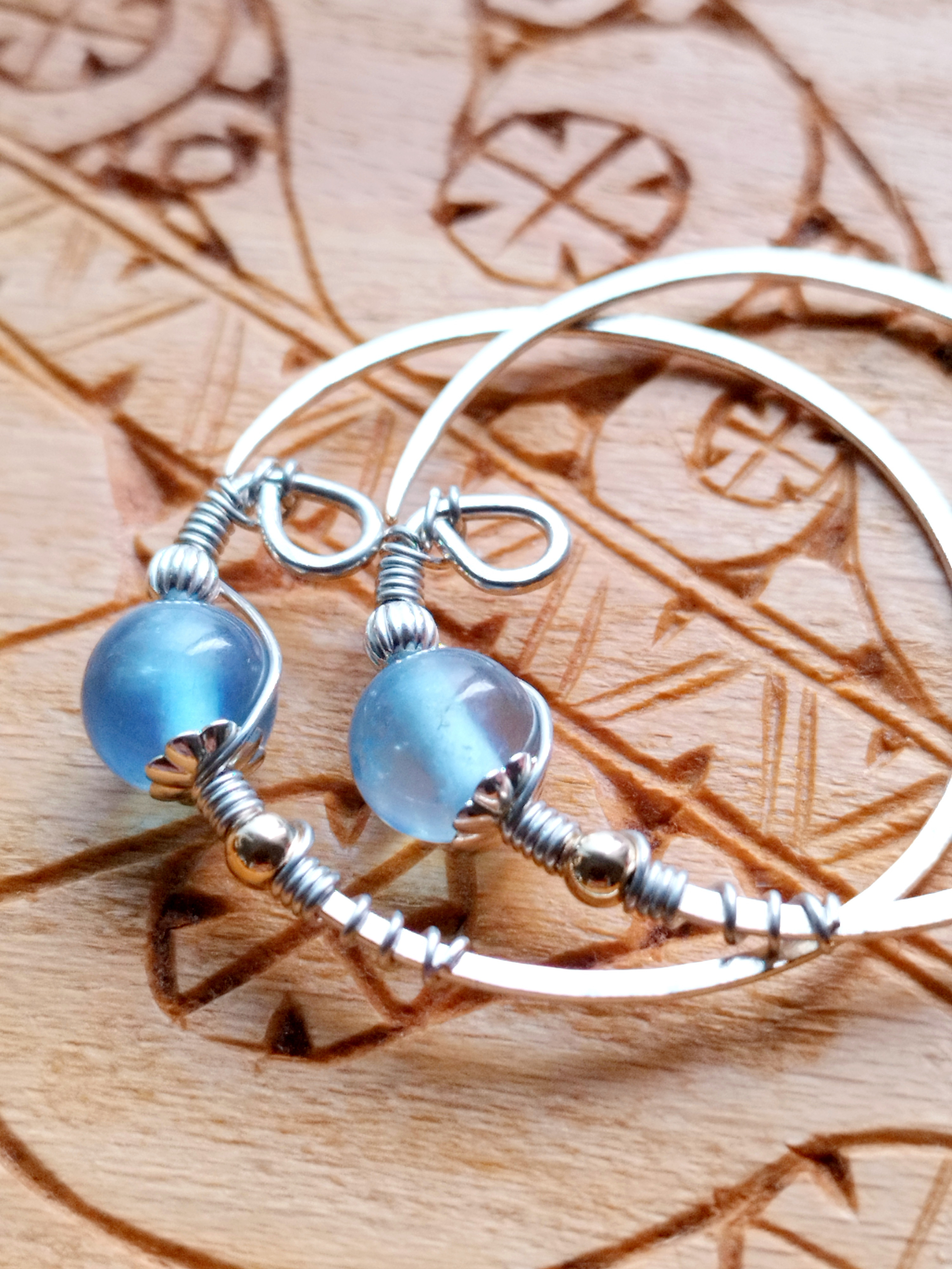 [受注製作]mem（メㇺ・湧水）のニンカリ【アイヌの耳飾り・ピアス】アクアマリン